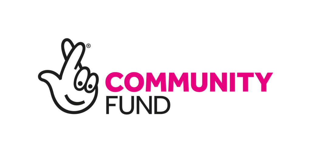 The word community in pink lettering and the word fund in black lettering. A line drawing of a hand with fingers crossed and a smile on the palm which looks like a face.